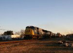 CSX 8768 leads a train southbound early in the morning